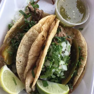 Two carnitas tacos with salsa verde and chips (not pictured). Four bucks. Yep.
