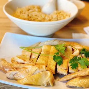 Hainan Chicken 1/2 chicken $18 with large chicken rice $5