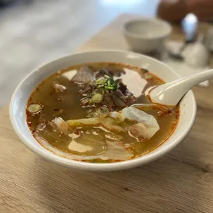 a bowl of soup on a table