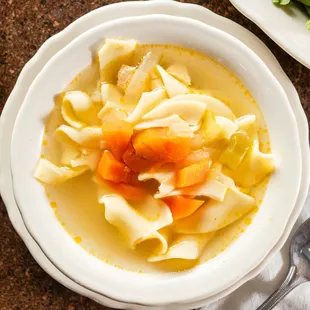 a bowl of chicken noodle soup