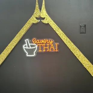a neon sign for a restaurant
