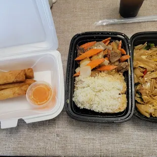 two take out containers of food
