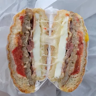 My custom breakfast sammie with sausage, bacon, egg, cheese n roasted red peppers!