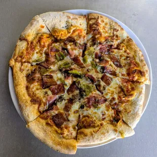 meat lover green chile pizza