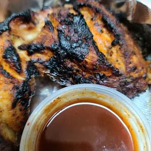 Burnt chicken tikka leg