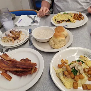 So large split between the two of us. Cowboy omelet with side of biscuits and gravy!!