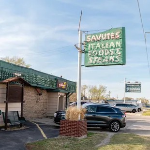 a car parked in front of a restaurant