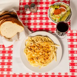 a plate of pasta and bread