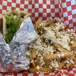 Chicken gyro with feta cheese on the fries