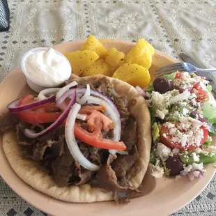 Gyro plate with Greek salad and lemon potatoes.