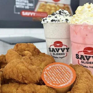 a plate of fried chicken and a drink