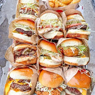 a tray of hamburgers and fries