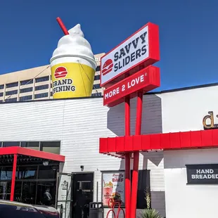 a giant ice cream cone with a straw