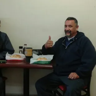 Enjoying a # 6 breakfast sandwich