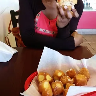 a woman sitting at a table
