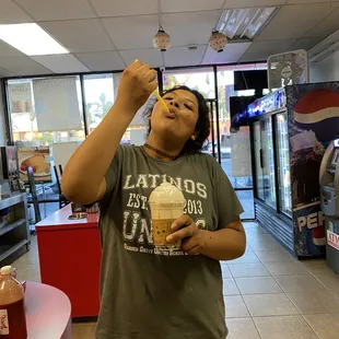 Me drinking the boba that tastes delicious