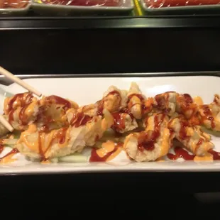 Some sort of white fish appetizer.