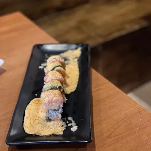 a plate of sushi on a table