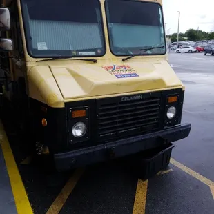 a food truck parked in a parking lot