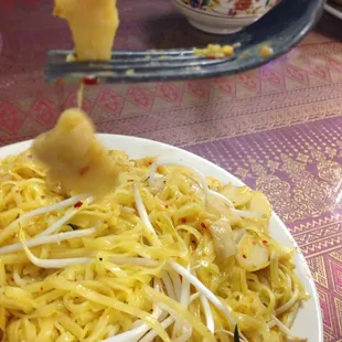 Yummy grizzle of chicken! One of four pieces I could find in my &quot;chicken pad Thai.&quot; All rubbery, with refusal to refund.