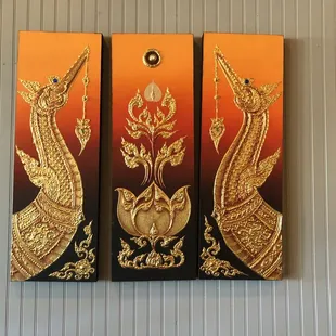 More a Thai art. This depicts the front of a royal barge.