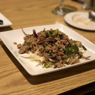 Laab salad with ground pork. Tons of meat, not a lot of salad.