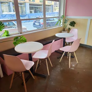 pink chairs and a table