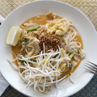 a bowl of noodles and meat