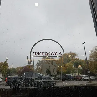 a view of a parking lot through a window
