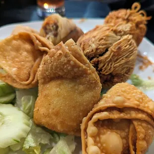 Appetizer platter with fried spring rolls, cream cheese wontons and sarongs.  So good!