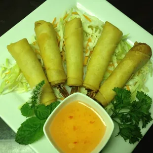 Gung Sarong. Fried shrimp in a pasty shell served with sweet and sour sauce.