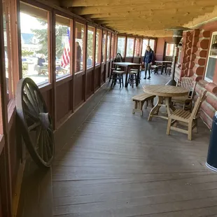 porch with tables and chairs