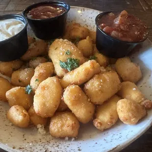 Wisconsin cheese curds delicious three sauces or habanero cranberry ranch chili salsa very good .