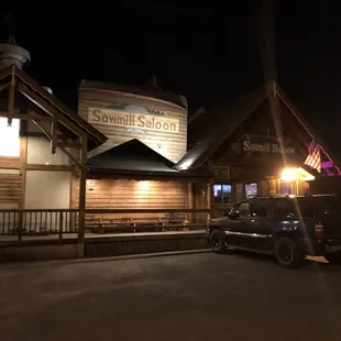a truck parked in front of a building