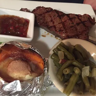8oz NY Strip with 2 sides and a salad, $14.95