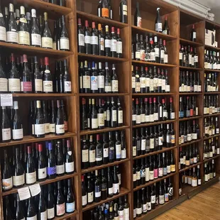 a wall full of wine bottles