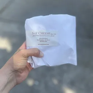 a person holding a piece of paper