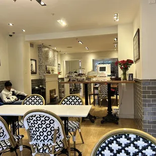 a man sitting at a table in a restaurant