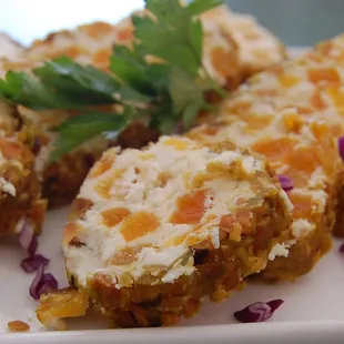 Dried apricot and chevre rolled in toasted pistachio nuts