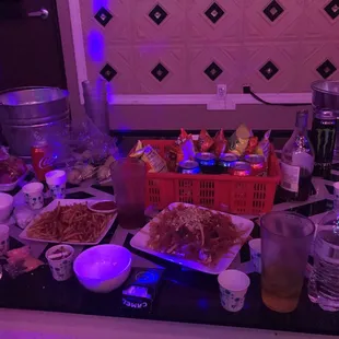 a table full of food and drinks