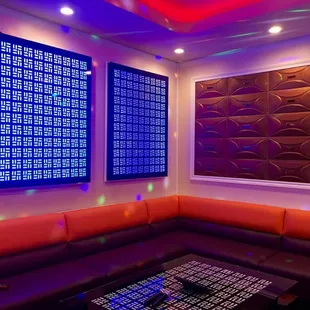 Beautifully decorated karaoke lounge, VIP room one. Beautiful lighting, quality sound system.