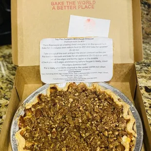Pumpkin pie with streusel topping.