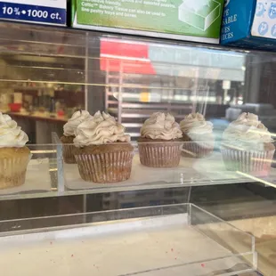 a display of cupcakes