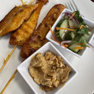 Chicken Satay with peanut sauce and cucumber salad
