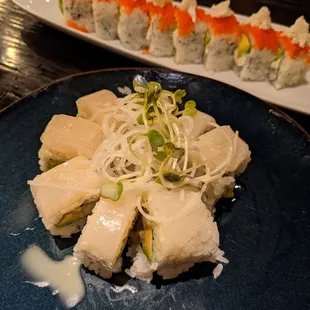 Special scallop roll with blue crab roll