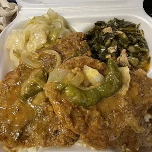 Daily Special Smothered Pork Chops with rice, collards and cabbage