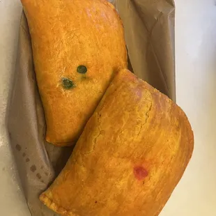 One beef patty, and one chicken curry patty