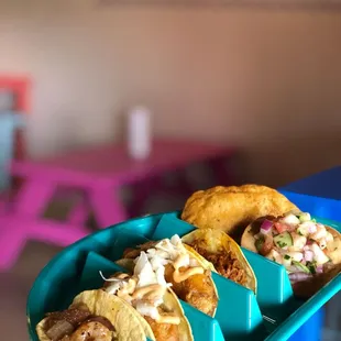 three tacos on a tray