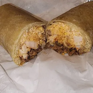 Surf and turf burrito sub chipotle sauce for guacamole. If this had more sauce it would be stellar