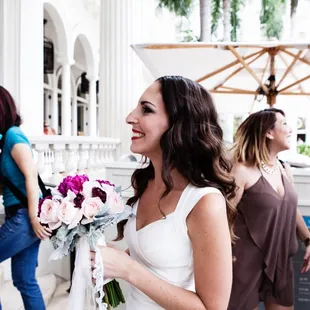 Bridal Bouquet. Style: Hand Tied - Open Color Scheme: Lace and Satin Thin Ribbon. Deep red, blush pinks, touches of white.